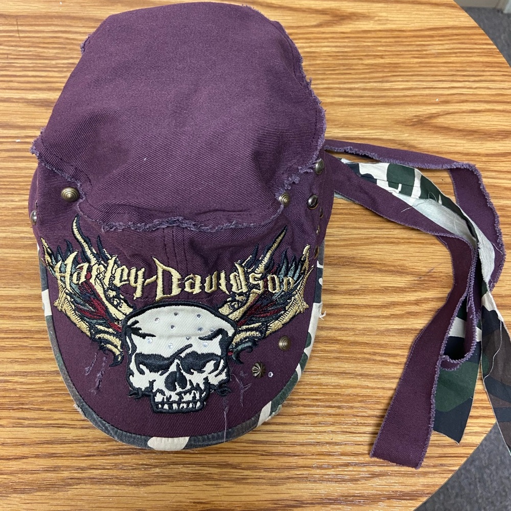 Harley-Davidson Tie back cap w brads and distressed detail.